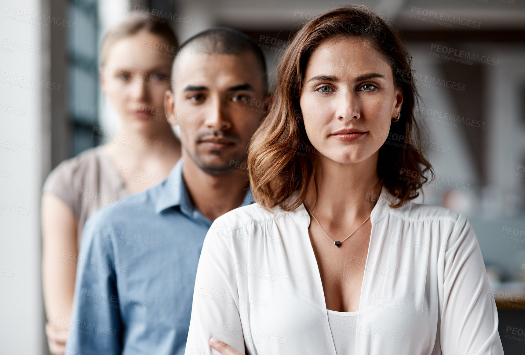 Buy stock photo Portrait of a group of businesspeople standing together in an office