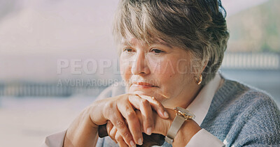 Buy stock photo Thinking, serious and senior woman in home with nostalgia, perspective and reflection in living room. Walking stick, space and elderly person in house with remember, memory or decision on retirement.