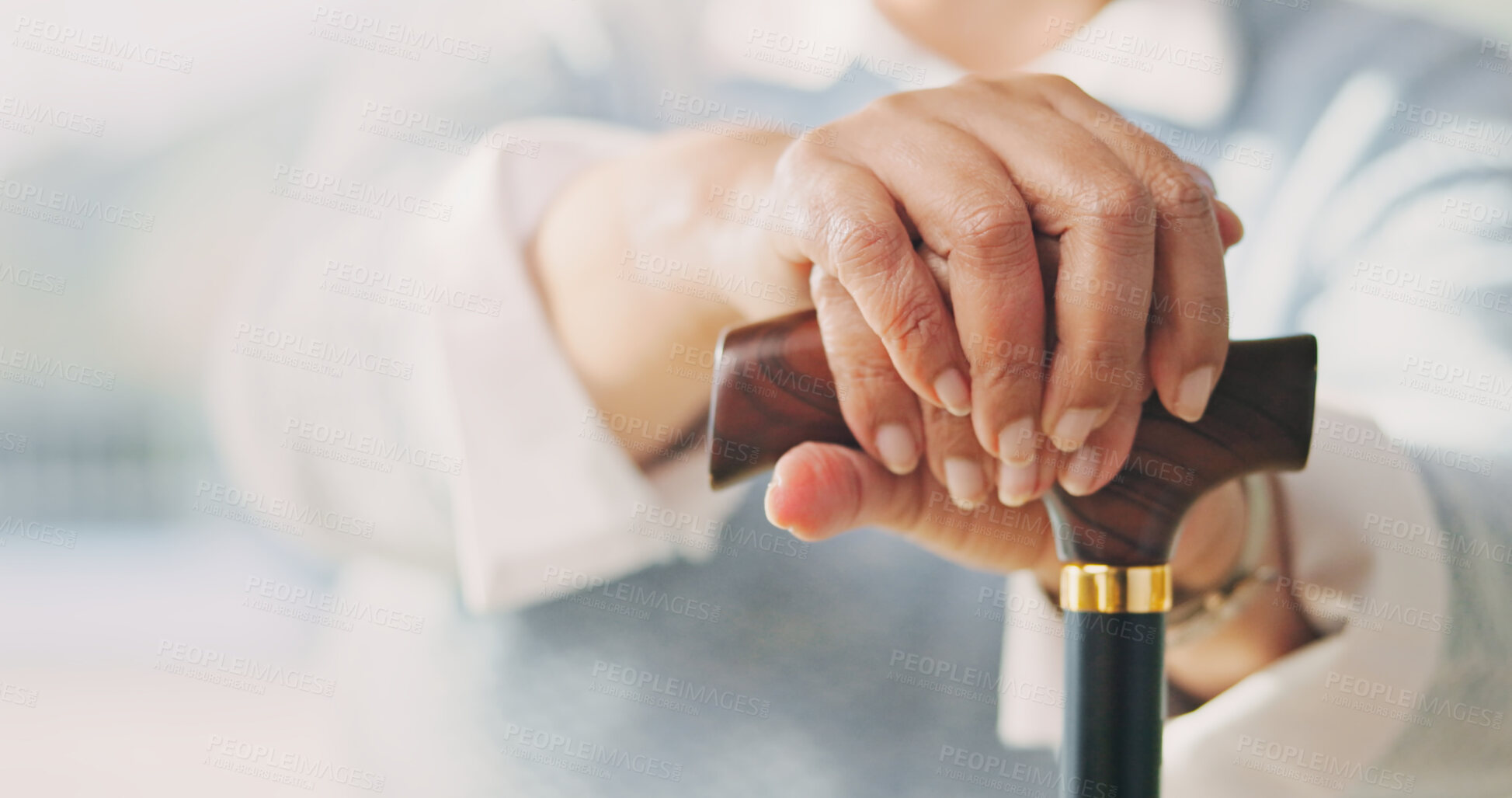 Buy stock photo Hands, cane and senior woman in home for recovery, balance or rehabilitation with support. Arthritis, retirement and elderly person with disability in home with wooden walking stick for mobility aid.