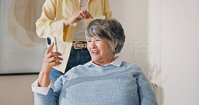 Buy stock photo Phone, hairdresser and senior woman in home for styling, grooming or cosmetic treatment. Cellphone, happy and stylist with elderly person for hair care routine with texting, chatting or social media.
