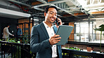 Happy, phone call and businessman with tablet in office, wealth management and chatting with contact. Business, financial advisor and person with mobile for communication, online or investment update