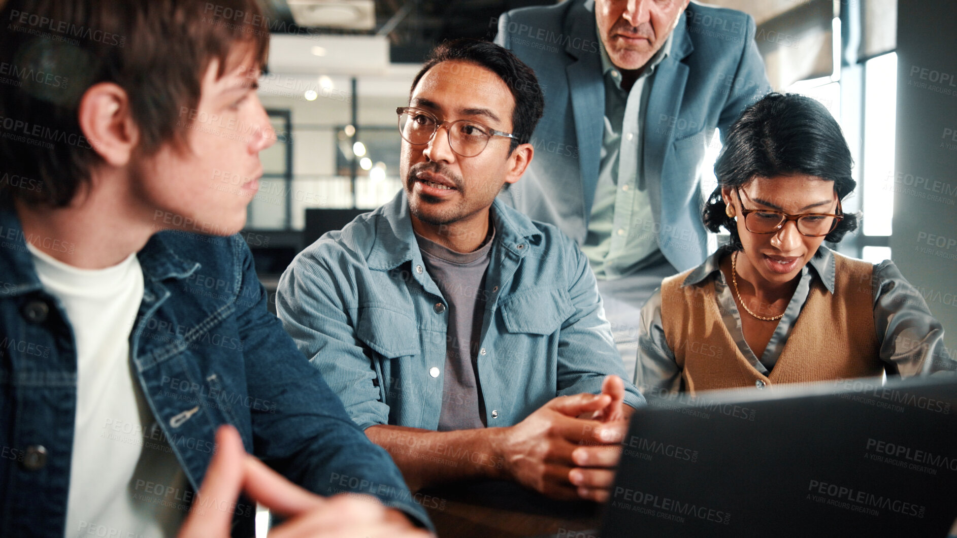 Buy stock photo Laptop, meeting and business people in office with feedback on software development project. Discussion, review and team of web designers with manager for advice on UI interface on computer at agency
