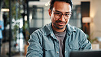 Creative, review and happy man with laptop in office, graphic designer or plan for project with info. Employee, smile and person with glasses, assignment and design research with tech in business
