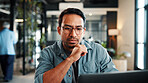 Creative, decision and man with laptop in office, graphic designer or planning for project with info. Serious, employee and person with glasses, thinking and design research with tech in business