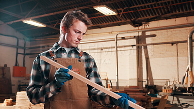 Buy stock photo Carpentry, plank and man in workshop for inspection, quality assurance and check for timber project. Carpenter, furniture and person with material for manufacturing, lumber production and woodworking