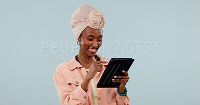 Buy stock photo Happy, network and black woman with tablet for connection or entertainment on a studio background. Female person, user or scrolling with smile on technology for internet connectivity or online app
