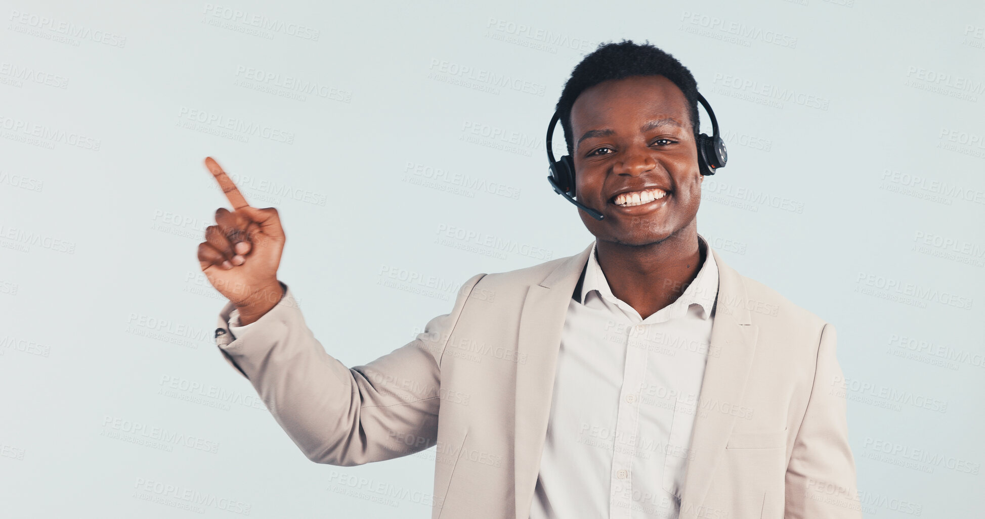 Buy stock photo Portrait, consultant and black man pointing in studio for online advice on a white background. Happy, businessman or agent with smile, headset or tips for virtual assistance, help or CRM on space
