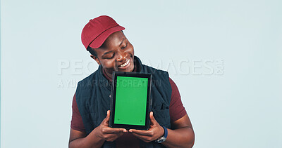 Buy stock photo Happy, tablet and delivery man in studio with green screen, ecommerce ui and courier advertising. Mockup, space and African person on tech for logistics, shipping and track order on white background