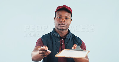 Buy stock photo Portrait, clipboard and courier man in studio for signature, postal service or distribution with space. Black person, delivery or shipping for order, logistics or paperwork to sign on blue background