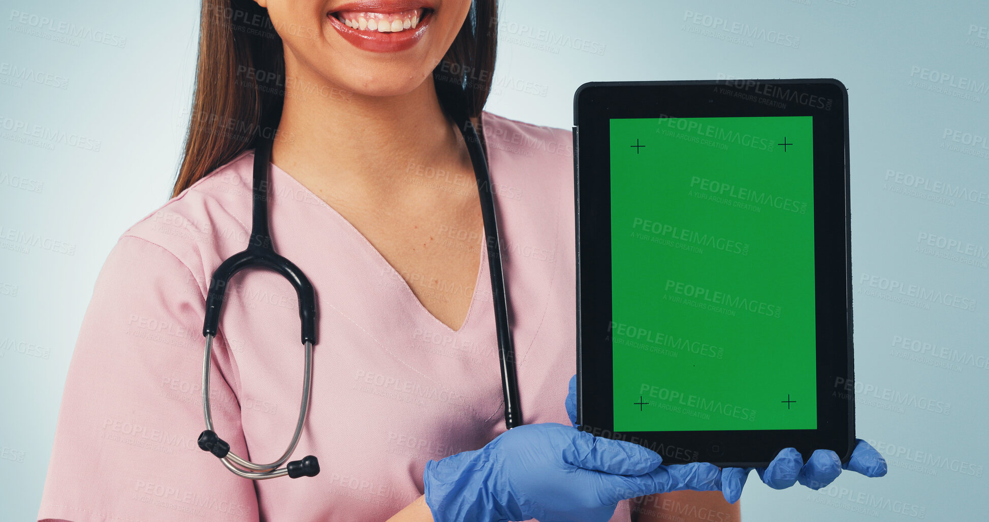 Buy stock photo Nurse, hands and happy woman with tablet green screen for advertising on a blue studio background. Female person, healthcare worker or smile with technology display for UI, UX or app on mockup space