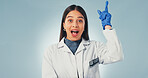 Idea, science and surprise with portrait of woman in studio for healthcare solution, eureka or pointing. Medical breakthrough, research and problem solving with person on white background for space