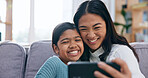 Love, mother and selfie with daughter on sofa in home living room for bonding or connection. Family, girl child and photograph with happy woman in apartment for break or relationship security