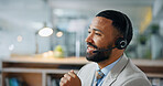 Business, man and headset in office at call centre, customer service and advice for online query. Smile, agent and mic in workplace for consultation, client support and crm representative of telecom