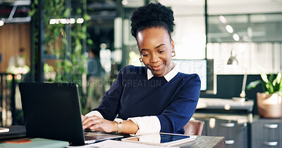 Buy stock photo Laptop, tablet and happy woman in office for reading email, ESG report or typing for review. Tech, sustainability consultant and black person in workplace with smile, CSR feedback and business