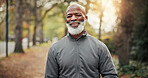 Portrait, black man and smile in nature for fitness, exercise and cardio training for morning routine. Senior person, runner or happy at park for endurance, physical activity and workout for wellness