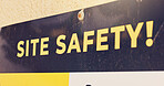 Safety, construction site and rules with sign on wall for notice, security and warning. Architecture, announcement and emergency with board for communication, industry control and engineering banner