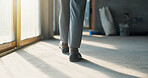 Person, legs and inspection for construction, contractor compliance or progress on site with walk. Safety manager, maintenance or quality assurance for renovation, engineering or project management