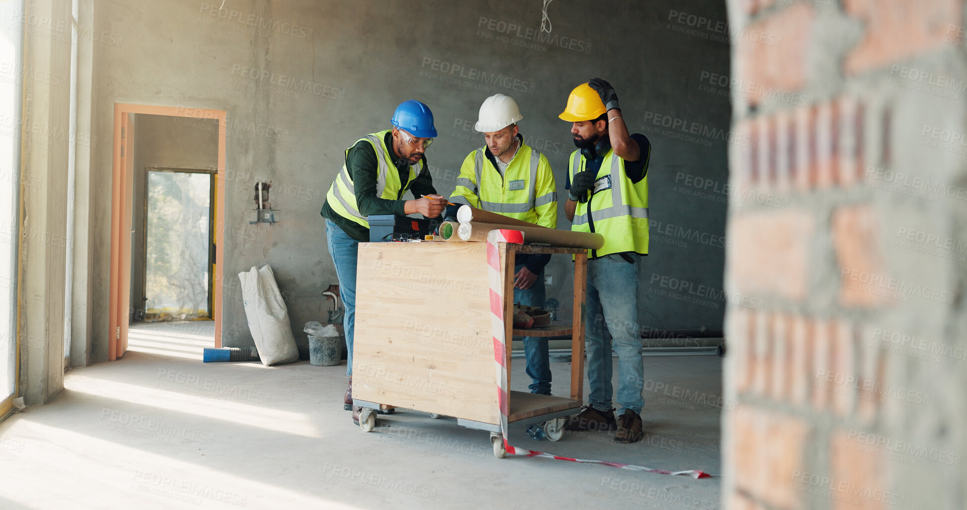 Buy stock photo Meeting, construction and people in building with blueprint for planning, teamwork and project update. Architecture, engineering and men in discussion for development, renovation and infrastructure