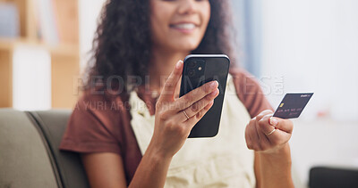 Buy stock photo Credit card, cellphone and hands of woman on sofa in home for online shopping, ecommerce or purchase. Technology, happy and person with internet banking for payment on phone in living room at house.