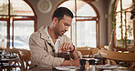 Late, reservation and man in restaurant with watch, impatient and waiting for first date. Worry, stress and person in cafe with clock check, uncertainty and bad time management for romantic outing.
