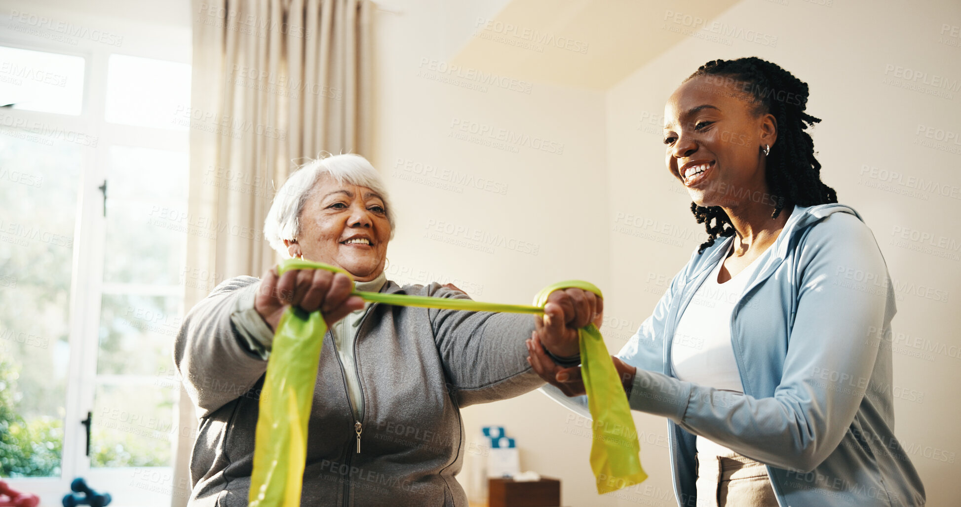 Buy stock photo Physio, help and old woman in clinic with resistance band, mobility workout and injury rehabilitation. Happy, healthcare worker and senior person with physical therapy equipment, support or wellness.