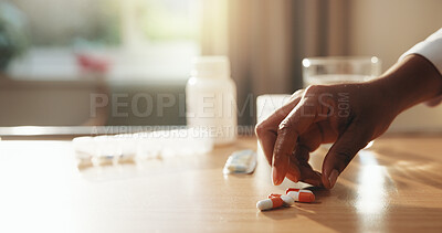 Buy stock photo Medical, healing and hand in home with pills, care plan and health treatment with medication. Healthcare, cure and woman with drugs, capsule option or recovery prescription in pharmaceutical solution