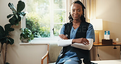 Buy stock photo Black woman, crossed arms and portrait of nurse in home with confidence for career in medical support. Professional, happy and healthcare worker with pride for about us at nursing job in house.