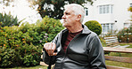 Senior, man and think with cane outdoor, retirement with balance aid or serious reflection on bench. Pensioner, memory or nostalgia for past perspective, relax in nature or walking stick for mobility