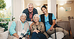 Support, nurse or old people in retirement home with portrait, bonding or happy moment on sofa. Smile, caregiver or senior friends with hug, loving relationship or patient connection in elderly care.