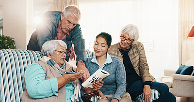Buy stock photo Caregiver, old people and reading at house with crossword, word search and quid for healthcare. Nurse, help and senior group in home with sudoku, problem solving and puzzle activity for brain teaser