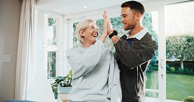 Buy stock photo Happy, physiotherapist and woman in office with high five, recovery goals or complete injury treatment. Healthcare worker, mature person and celebration with rehabilitation success, wellness and help