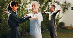 Fitness, outdoor and senior people with instructor for stretching, active hobby or pilates for health. Retirement, happy and woman with elderly group, help and yoga for wellness, balance and exercise