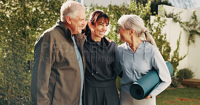 Buy stock photo Happy, outdoor and senior couple with trainer for practice, active hobby and pilates for health. Retirement, smile and woman with elderly people, hug and yoga mat for wellness, fitness or exercise