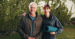 Outdoor, portrait and man with with yoga mat for exercise, wellness and practice for health. Morning, happy and trainer with senior person for pilates, fitness routine and active hobby in backyard