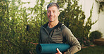 Outdoor, portrait and mature man with yoga mat for exercise, wellness and practice for health. Morning, happy and person with equipment for pilates, fitness routine and active hobby in backyard