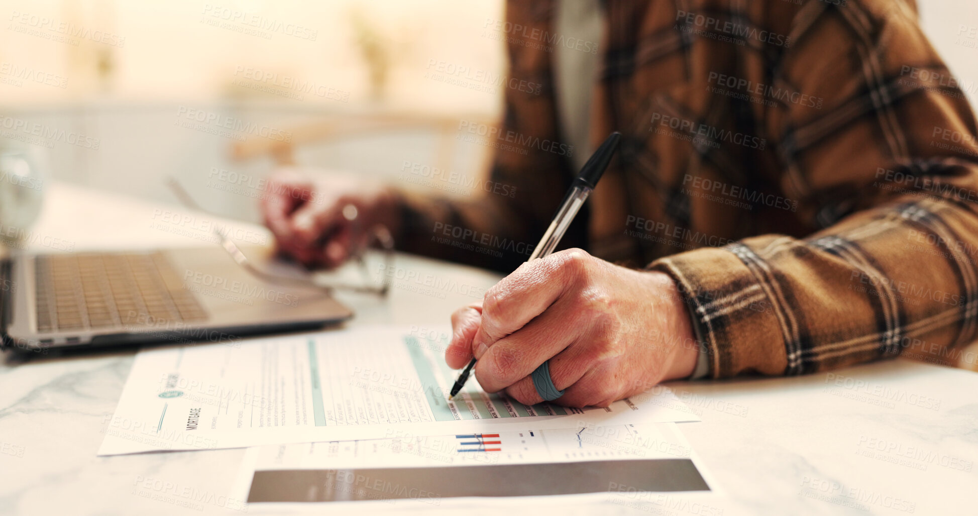 Buy stock photo Finance, hands and writing on form in home for homeowner insurance, personal info or legal agreement. Laptop, man or filling papers at table for mortgage protection, house registration and compliance