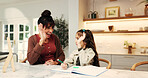 Girl, mother and high five with homework, support and book for celebration with education in home. People, mom and child for assignment success, learning and studying for development at family house