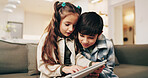 Kids, siblings and play in home with tablet, online educational website and game for bonding together. Children, brother and sister learning in house with tech, gaming and internet for entertainment.