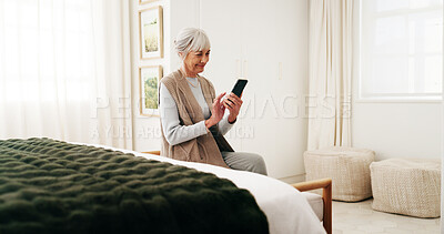 Buy stock photo Bedroom, texting and senior woman with phone, online and communication with contact on social media. Reading, message and happy person with mobile on bed, chat and networking on website in house