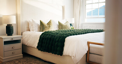 Buy stock photo Empty, room and bed in hotel, hospitality and furniture with decor, real estate and interior design. Luxury, accommodation and cozy blanket in bedroom, comfort and tidy motel or travel destination