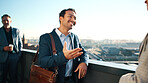 Businessman, discussion or balcony with city view for business conversation, introduction or social. Happy man, employee or talking with smile for friendly chat, meeting or negotiation in urban town