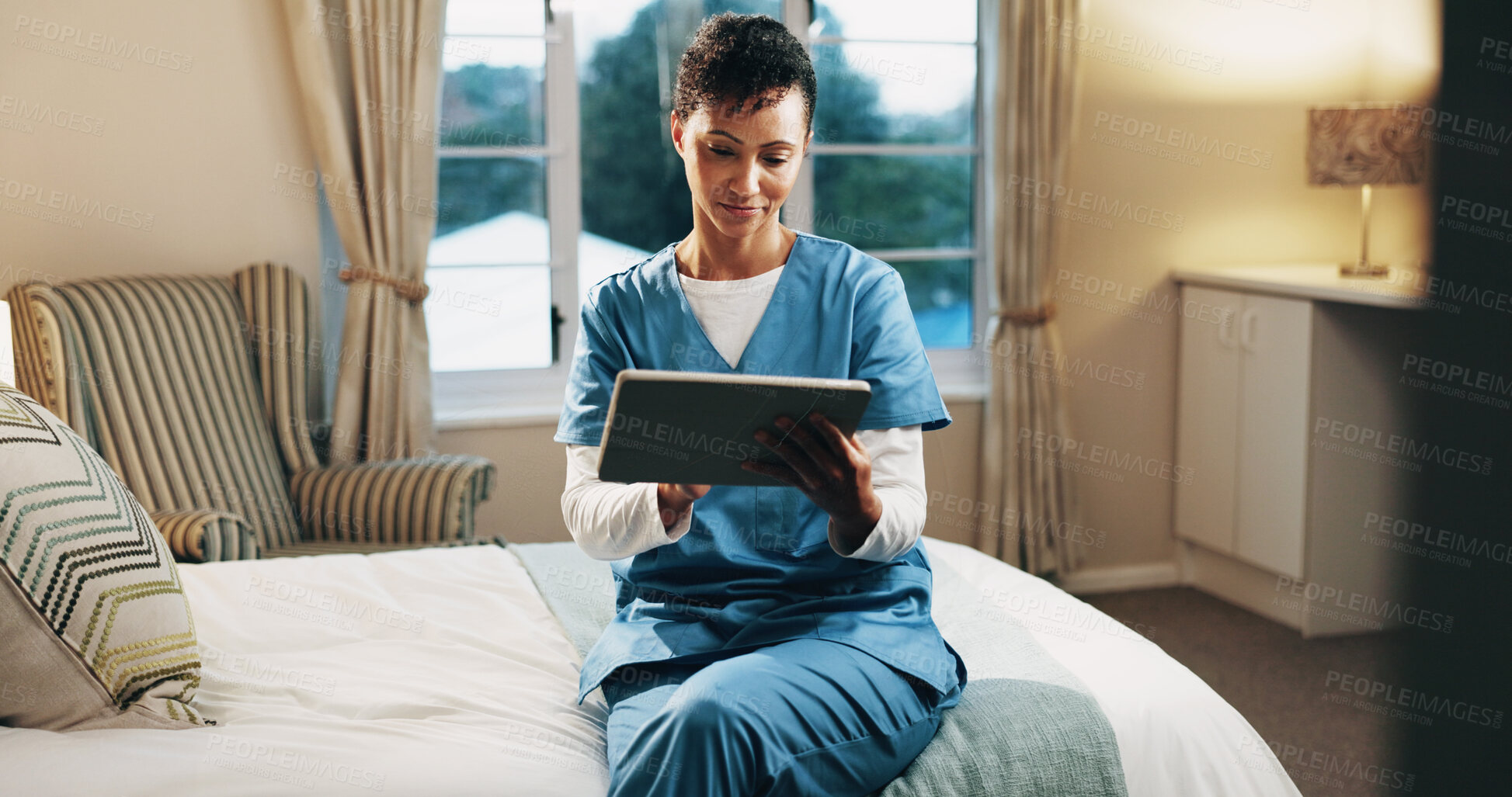 Buy stock photo Nurse, bed and happy woman with tablet for medical research, help or volunteering service. Mature person, healthcare worker or caregiver with smile or technology for health report in nursing home