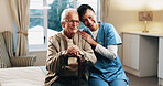 Bedroom, portrait and nurse with senior man for support, bonding and care for assisted living. Retirement, nursing home and caregiver embrace elderly person for connection, wellness or trust for help