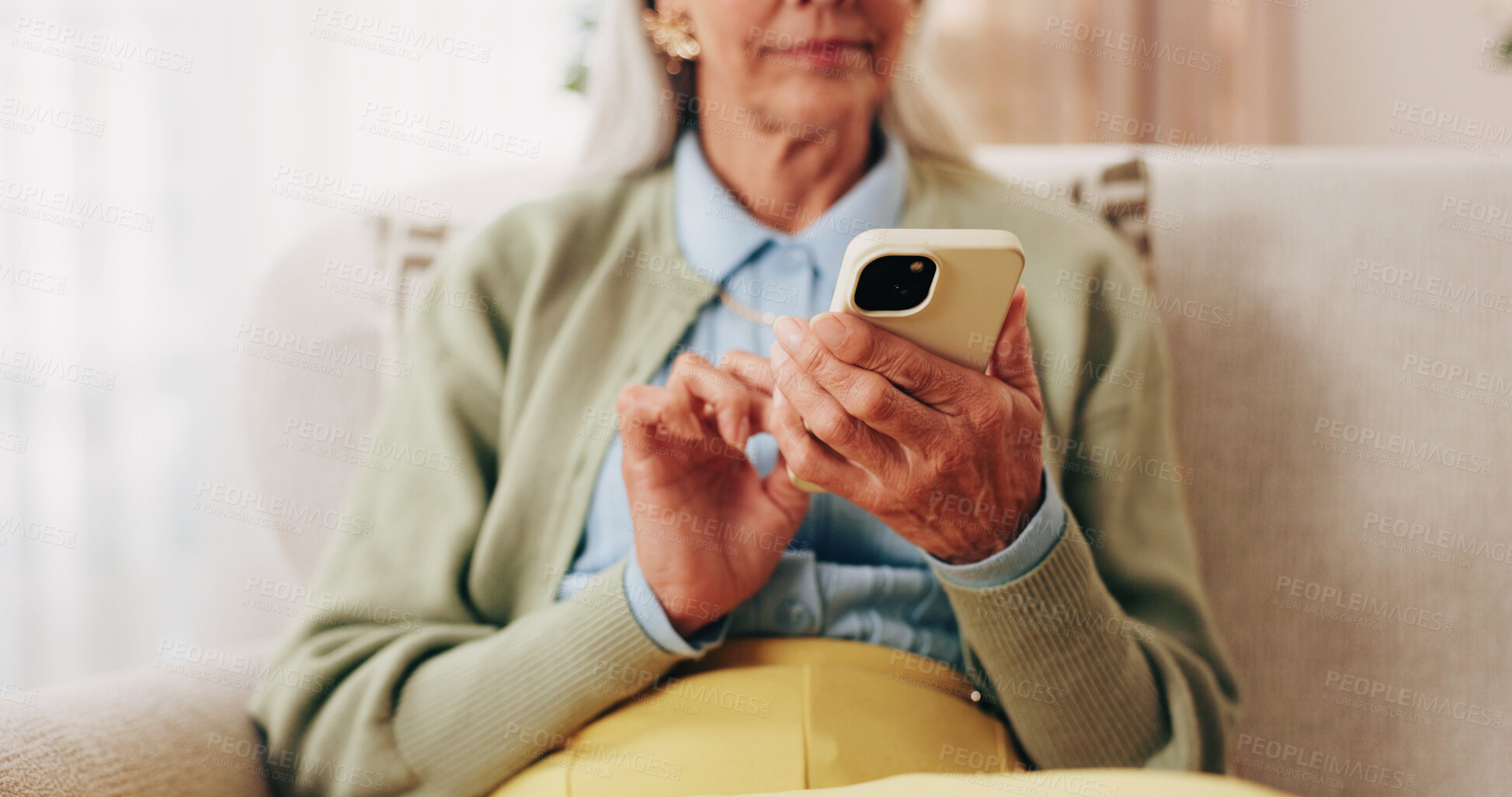 Buy stock photo Hands, sofa and senior woman with phone, social media and connection for online chat on weekend. Retirement, scroll and elderly person on mobile app for communication, notification or contact in home