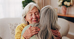 Friends, hug and love with old women in home for bonding, good news or retirement. Happiness, support and social reunion with senior people in living room for embrace, smile and care in house