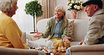 Friends, tea party and smile with old people in home for bonding, retirement and together. Drinks, relax and social reunion with senior group in living room for breakfast, gossip and chat in house