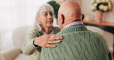 Buy stock photo Comfort, hand and shoulder with senior people in home living room for bonding, support or wellness. Consoling, empathy and love with elderly friends in apartment together for grief, loss or pain