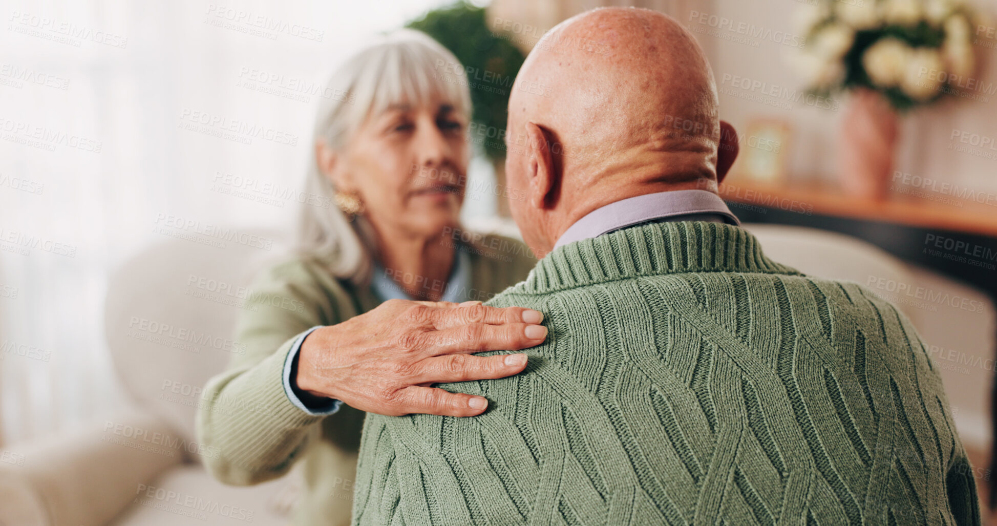 Buy stock photo Comfort, hand and shoulder with senior people in home living room for bonding, support or wellness. Consoling, empathy and love with elderly friends in apartment together for grief, loss or pain