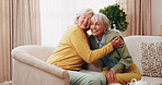 Friends, hug and smile with old women in home for bonding, good news or retirement. Happiness, love and social reunion with senior people in living room for embrace, support and care in house