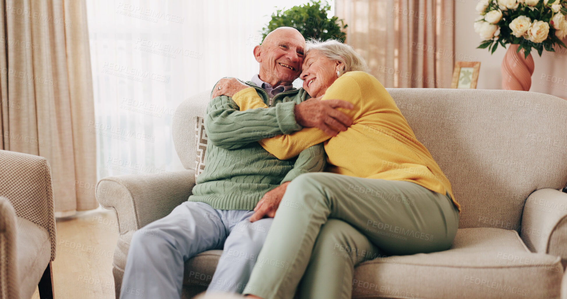 Buy stock photo Care, hug and senior couple in home for love, relationship security and loyalty with happy partner. Man, woman and embrace on sofa with trust, smile and connection together with support in retirement